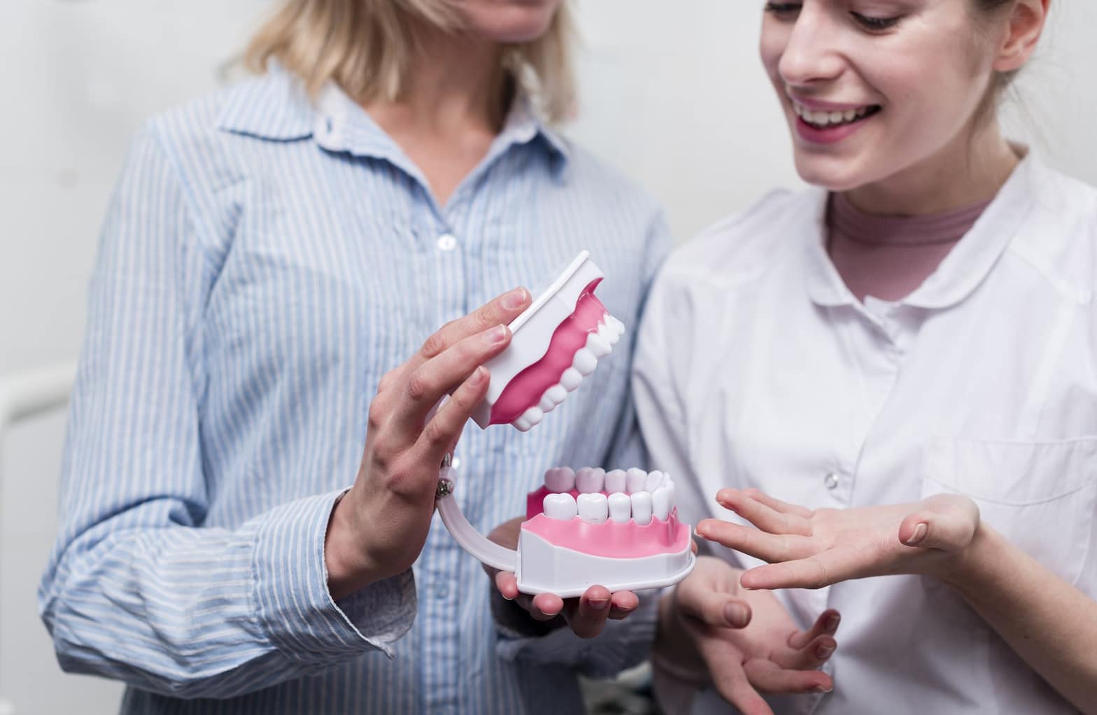 Dental Bridge vs Implant