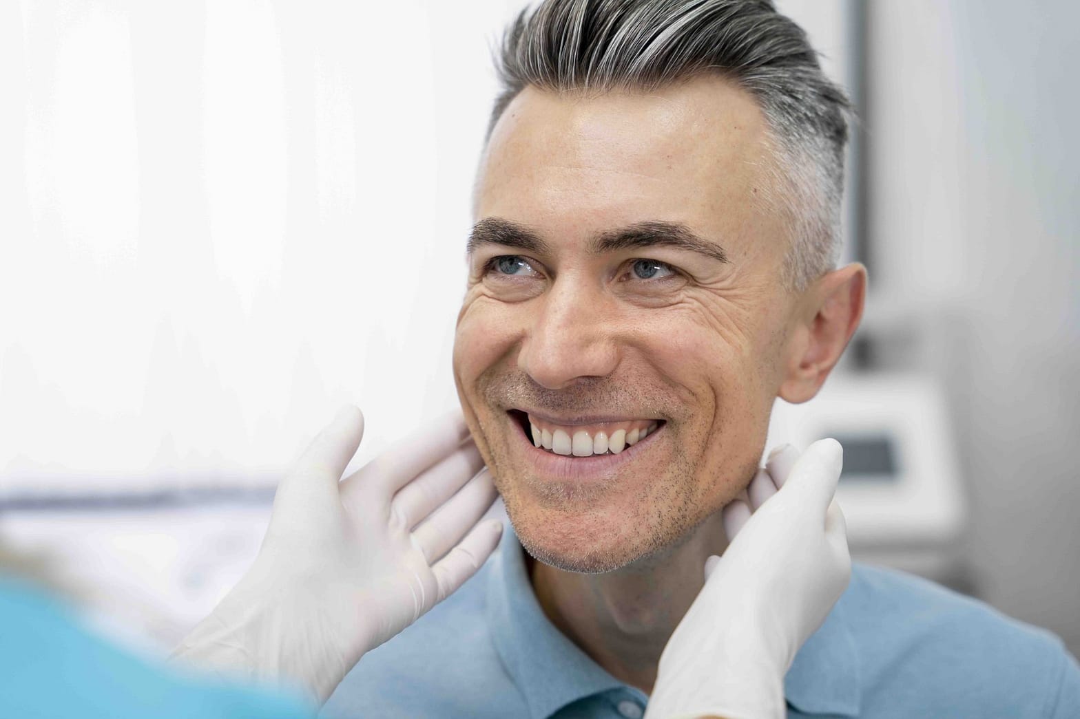 dentist checking immediate load implant application