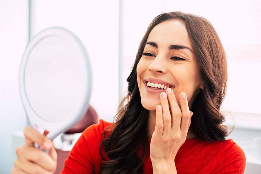Womain in the last dental implant healing stages